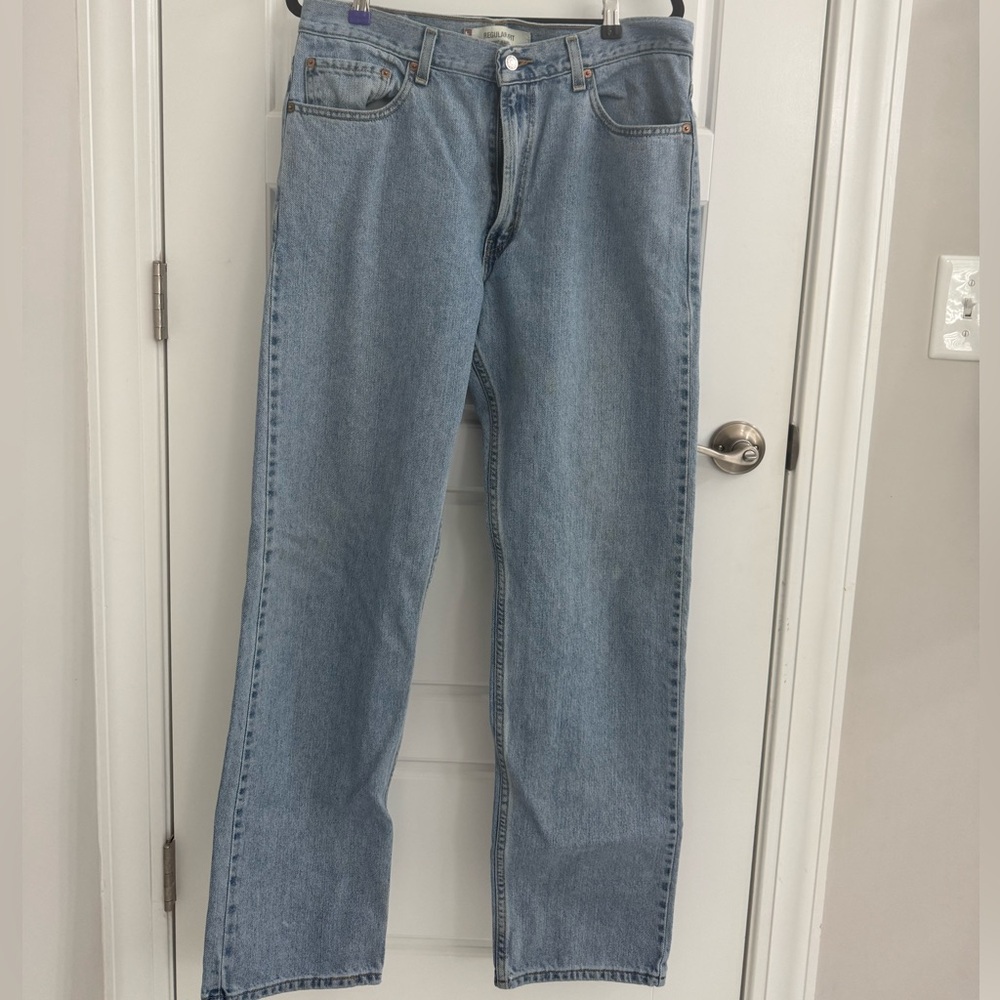 Vintage Levis 505 regular fit straight leg jeans in a stone wash Size 36/34